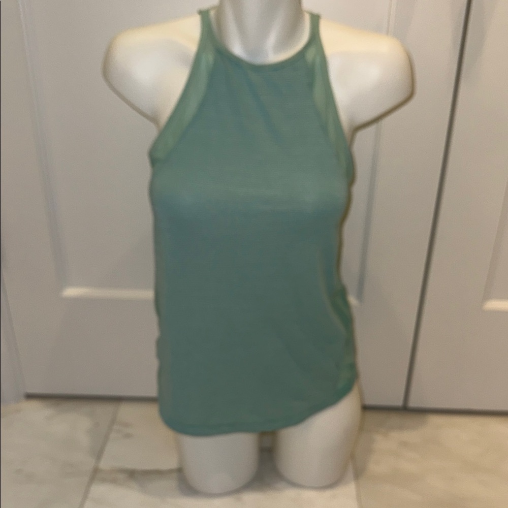 Lululemon run off route tank Top size 6/8 high neck in a Sea foam color